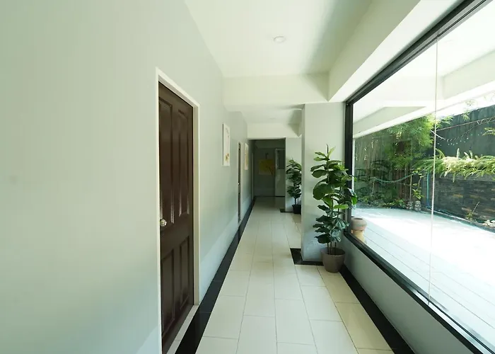 Roomquest Don Mueang Airport Отель